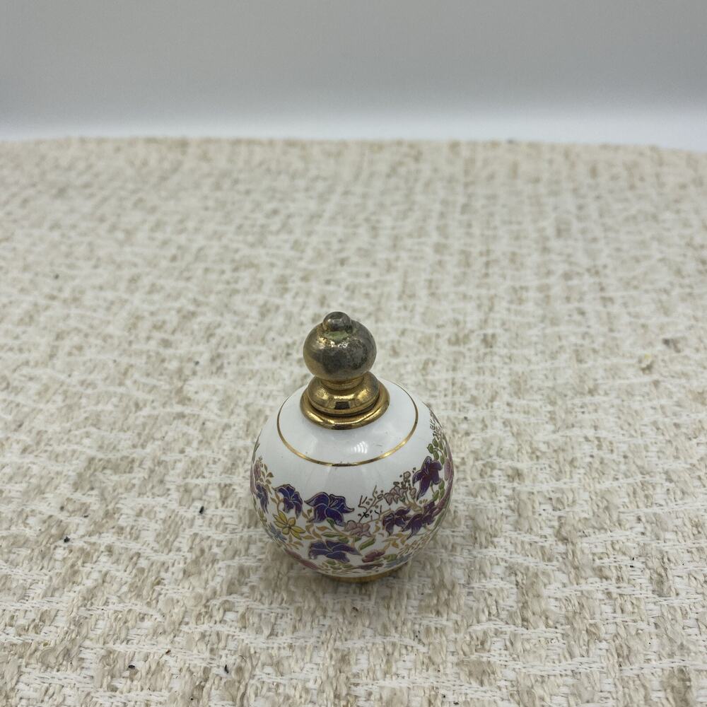 Ceramic perfume bottle with floral design 2.5 Inches tall